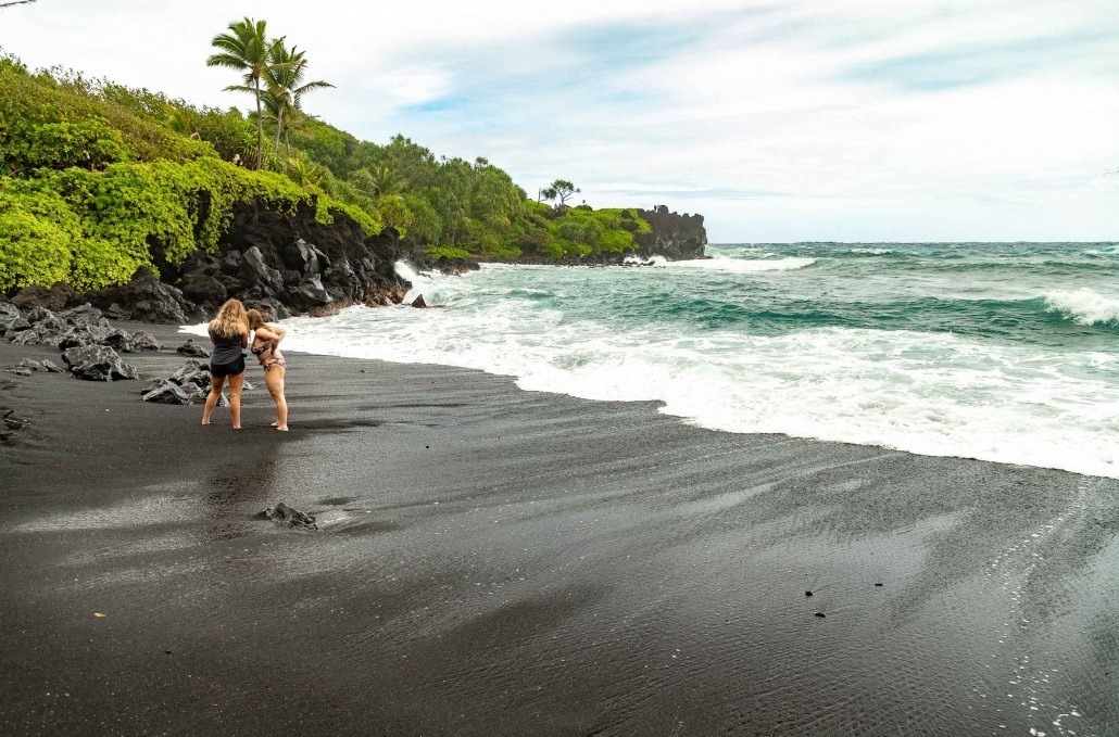 Black Sand Beach Visitors Swim Waianapanapa Road to Hana Maui