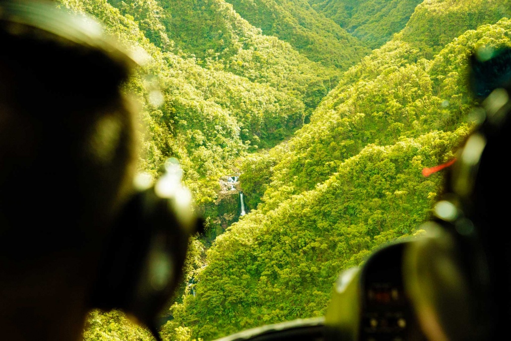 flying over mauis beautiful jungle in a helicopter