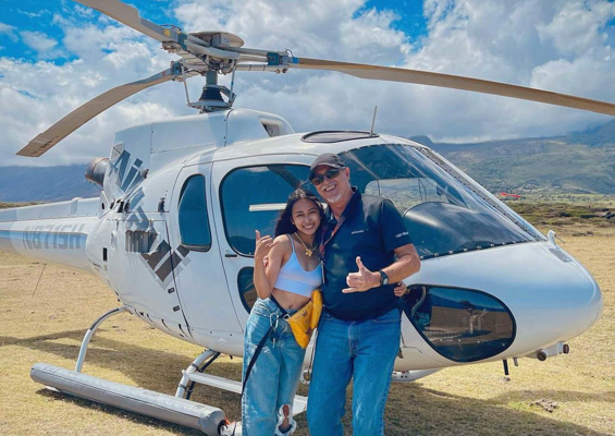 airmaui mountain waterfalls helicopter ride guest and pilot slider