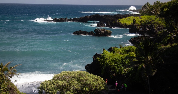 black sand beach sea cave ocean view