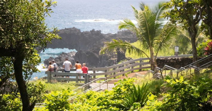 black sand beach sea cave overview