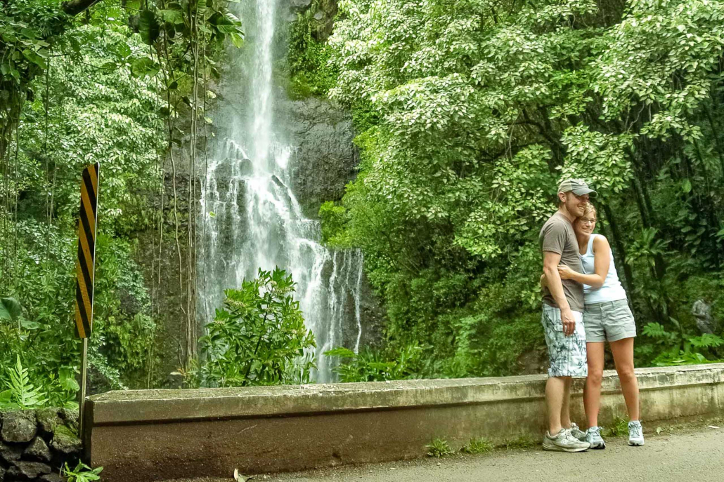 waterfall couple visitors road to hana maui romantic
