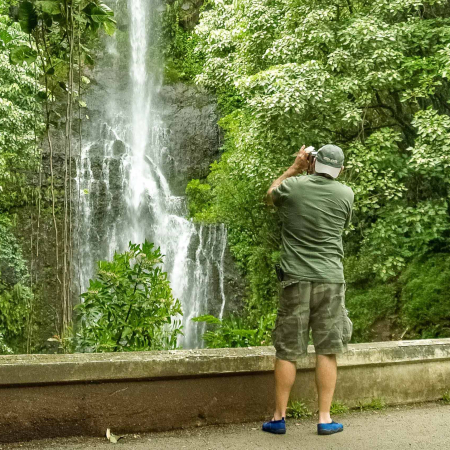 road to hana waterfall and visitor photography maui